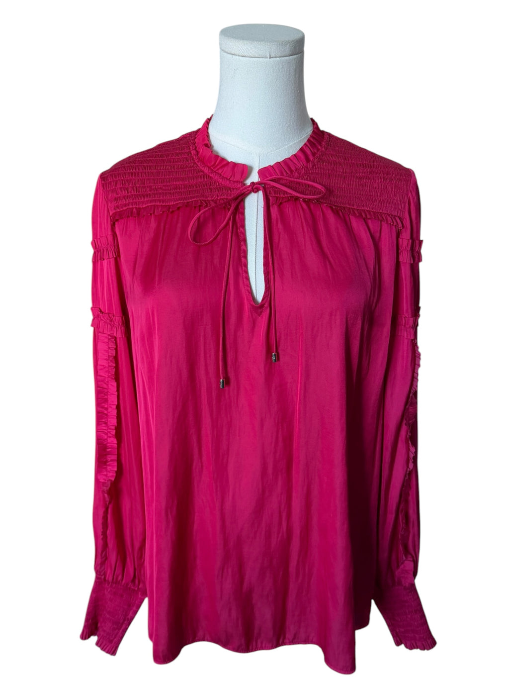 vibrant fuchsia pink long-sleeve blouse from White House Black Market
