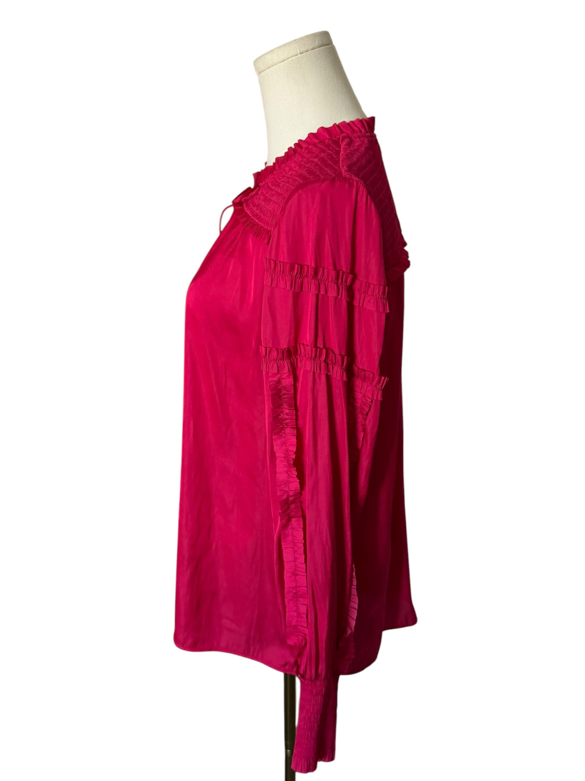 vibrant fuchsia pink long-sleeve blouse from White House Black Market