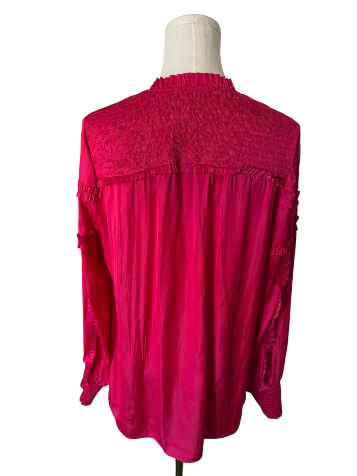 vibrant fuchsia pink long-sleeve blouse from White House Black Market