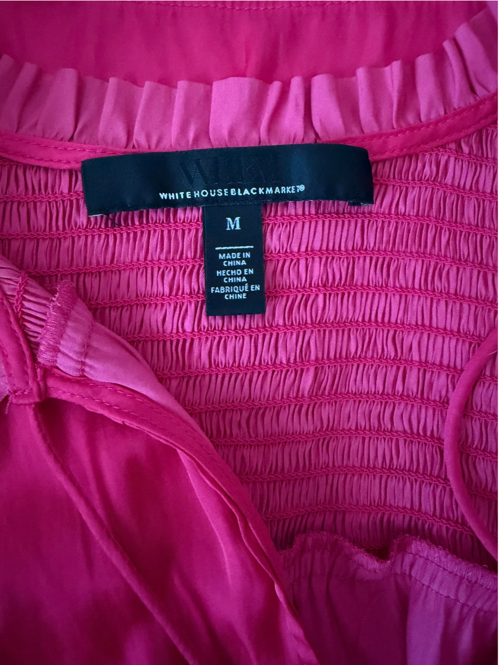 vibrant fuchsia pink long-sleeve blouse from White House Black Market