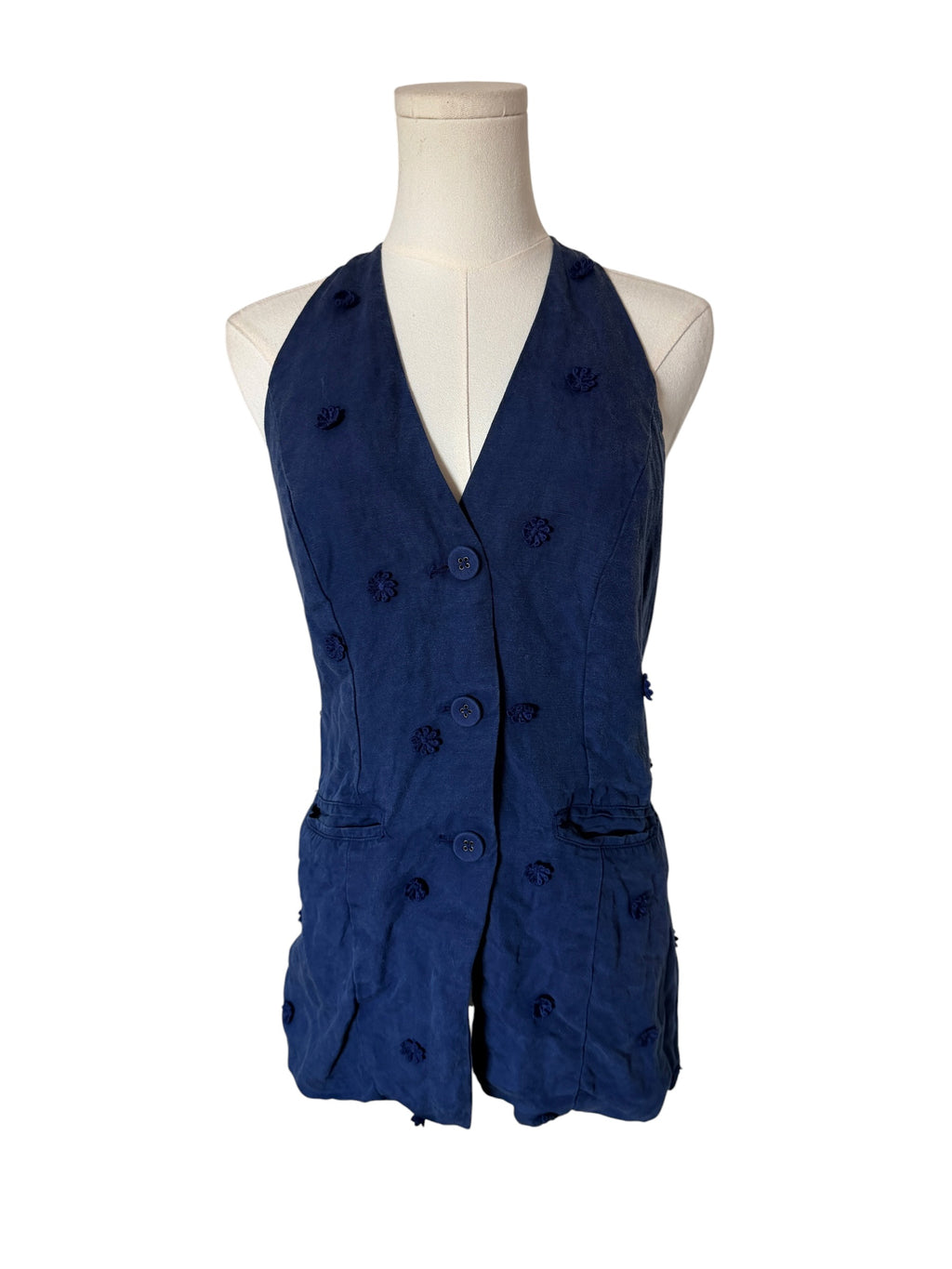 Maeve for Anthropologie navy blue halter vest featuring 3D floral appliqués