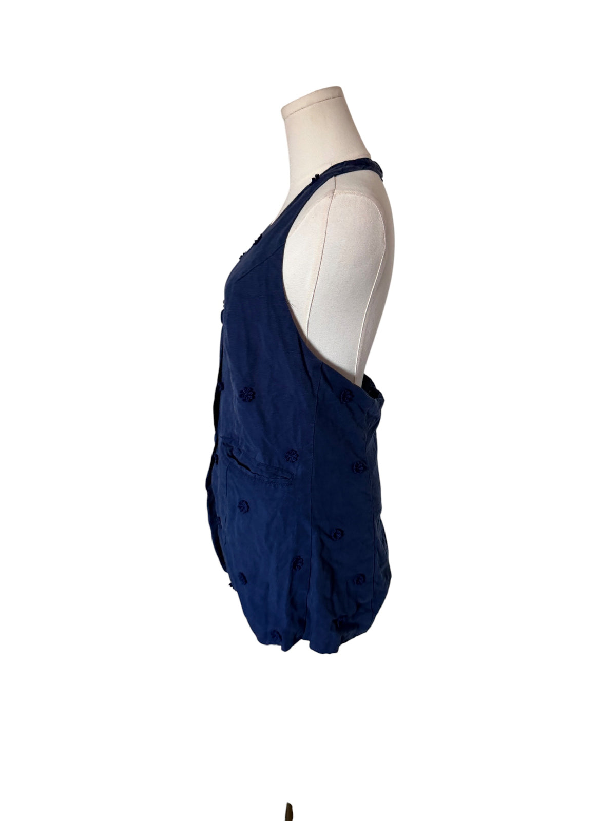 Maeve for Anthropologie navy blue halter vest featuring 3D floral appliqués