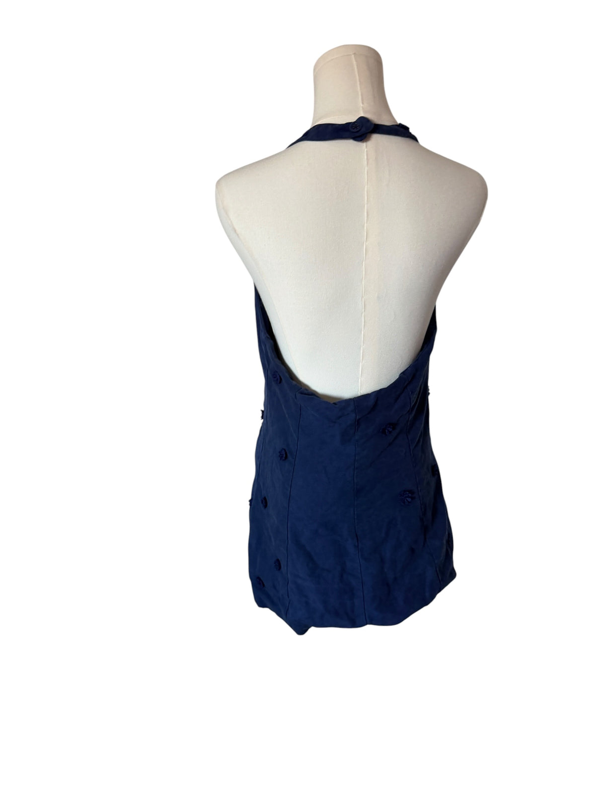 Maeve for Anthropologie navy blue halter vest featuring 3D floral appliqués