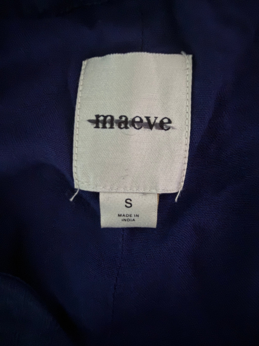 Maeve for Anthropologie navy blue halter vest featuring 3D floral appliqués