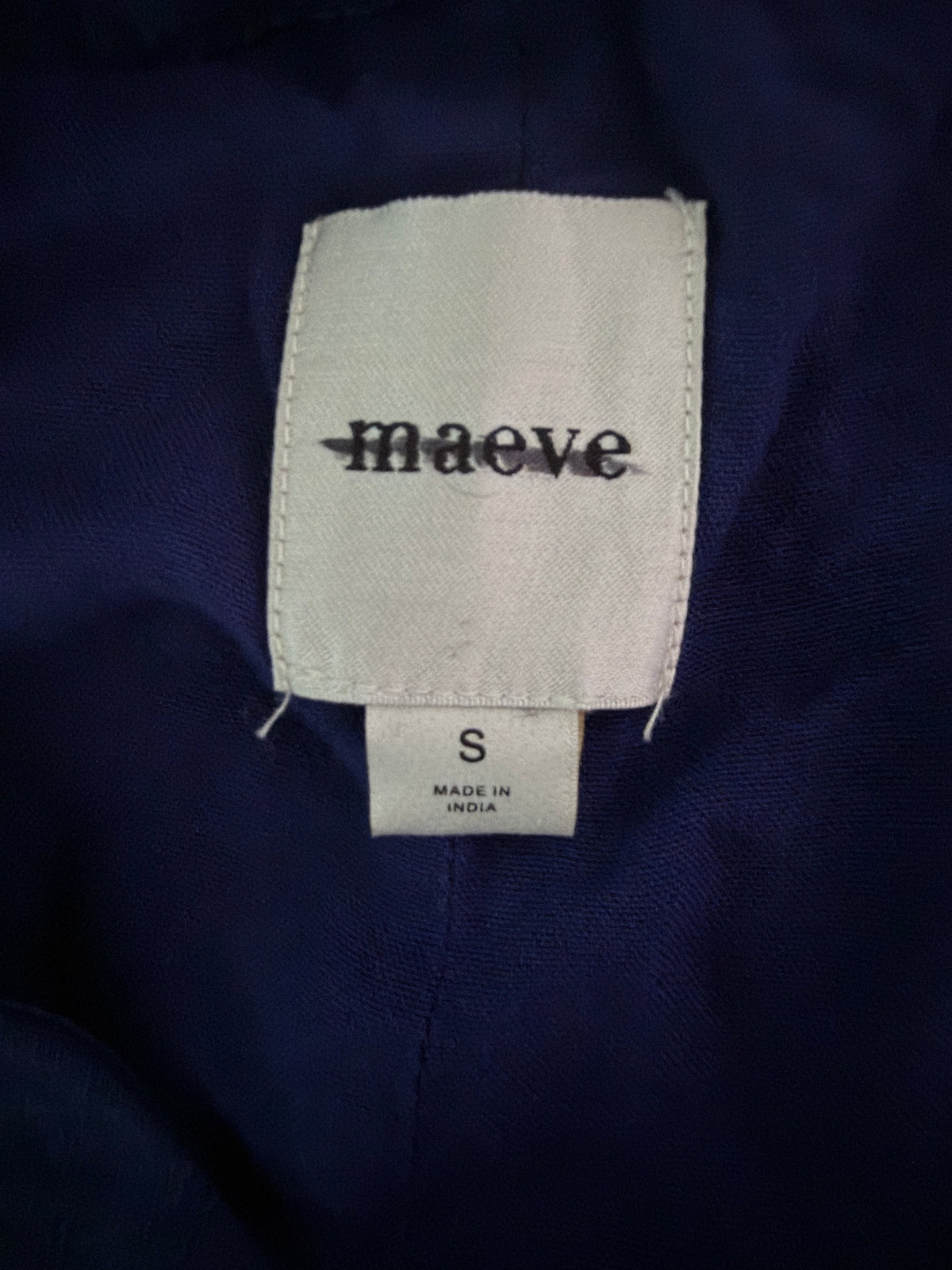 Maeve for Anthropologie navy blue halter vest featuring 3D floral appliqués