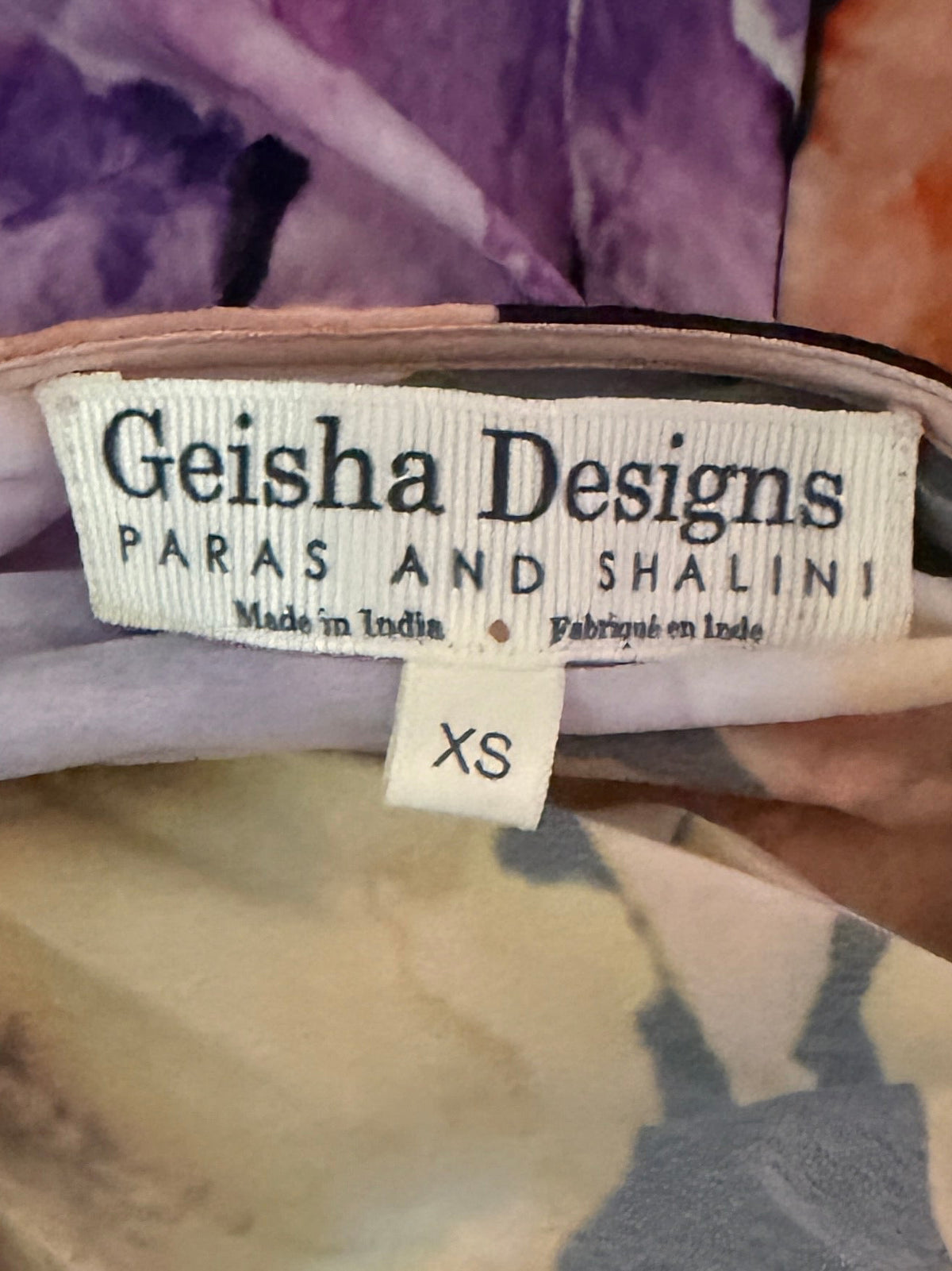 Geisha Designs asymmetrical hem midi dress sold at Anthropologie