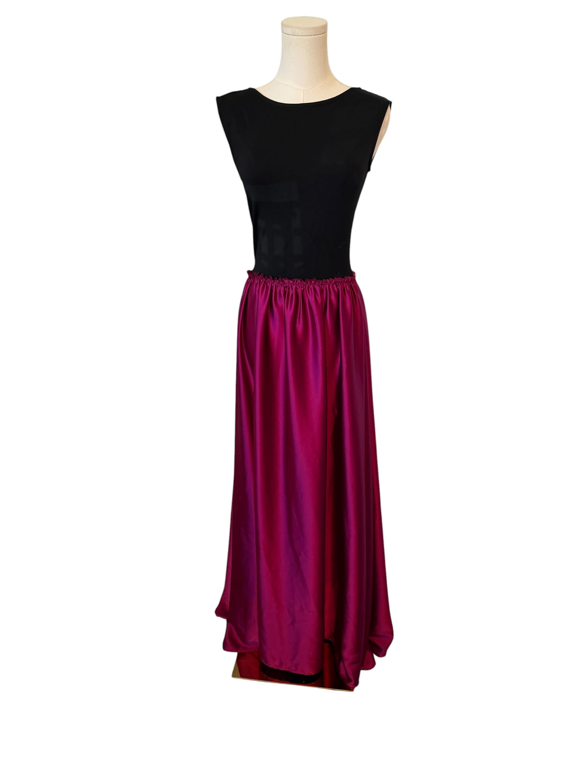 Ripley Rader Ashley Satin Dress with a vibrant magenta skirt.
