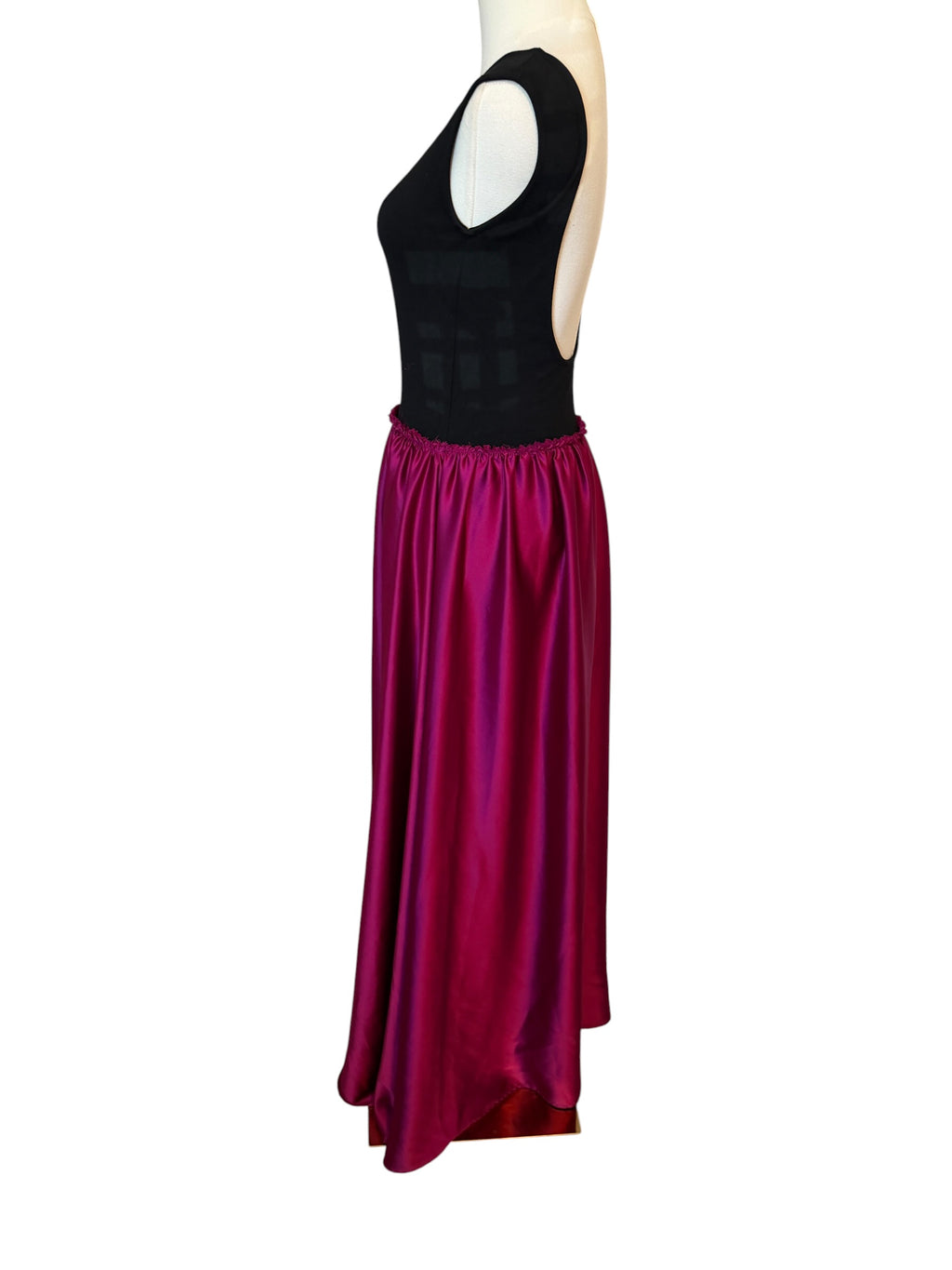 Ripley Rader Ashley Satin Dress with a vibrant magenta skirt.