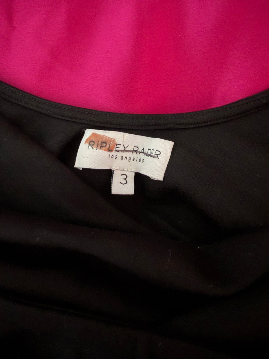 Ripley Rader Ashley Satin Dress with a vibrant magenta skirt.