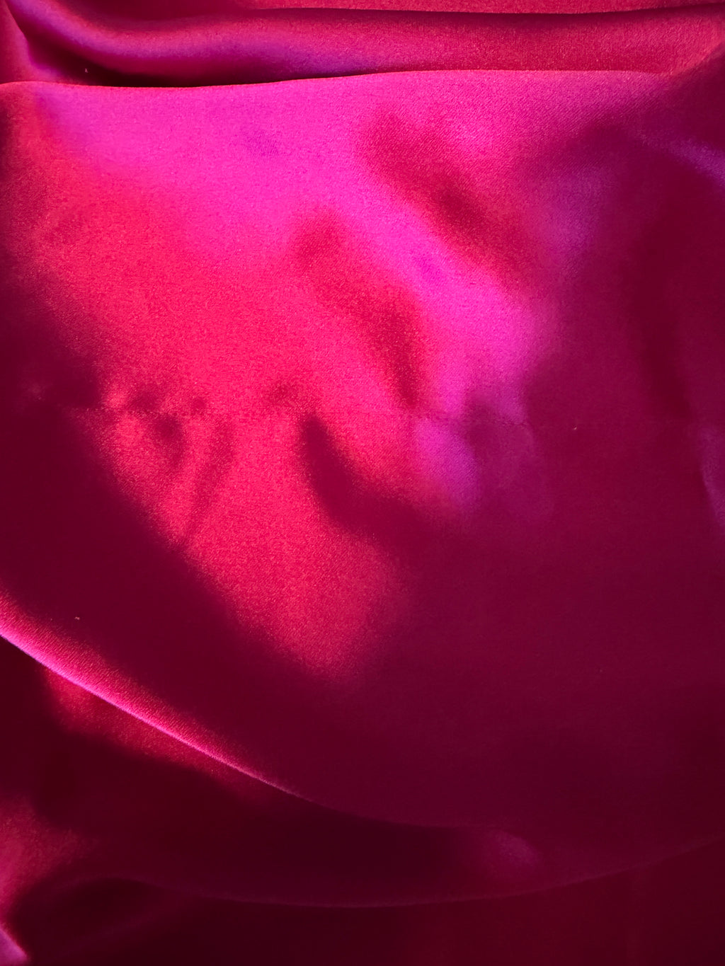 Ripley Rader Ashley Satin Dress with a vibrant magenta skirt.