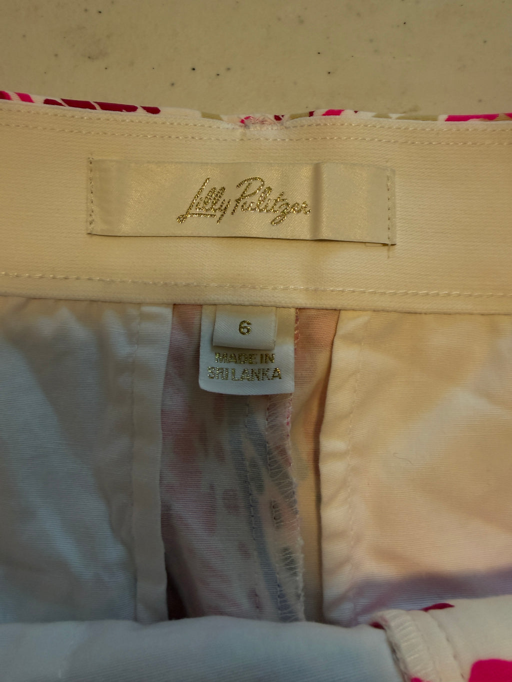 Lilly Pulitzer shorts feature a vibrant pink paisley print
