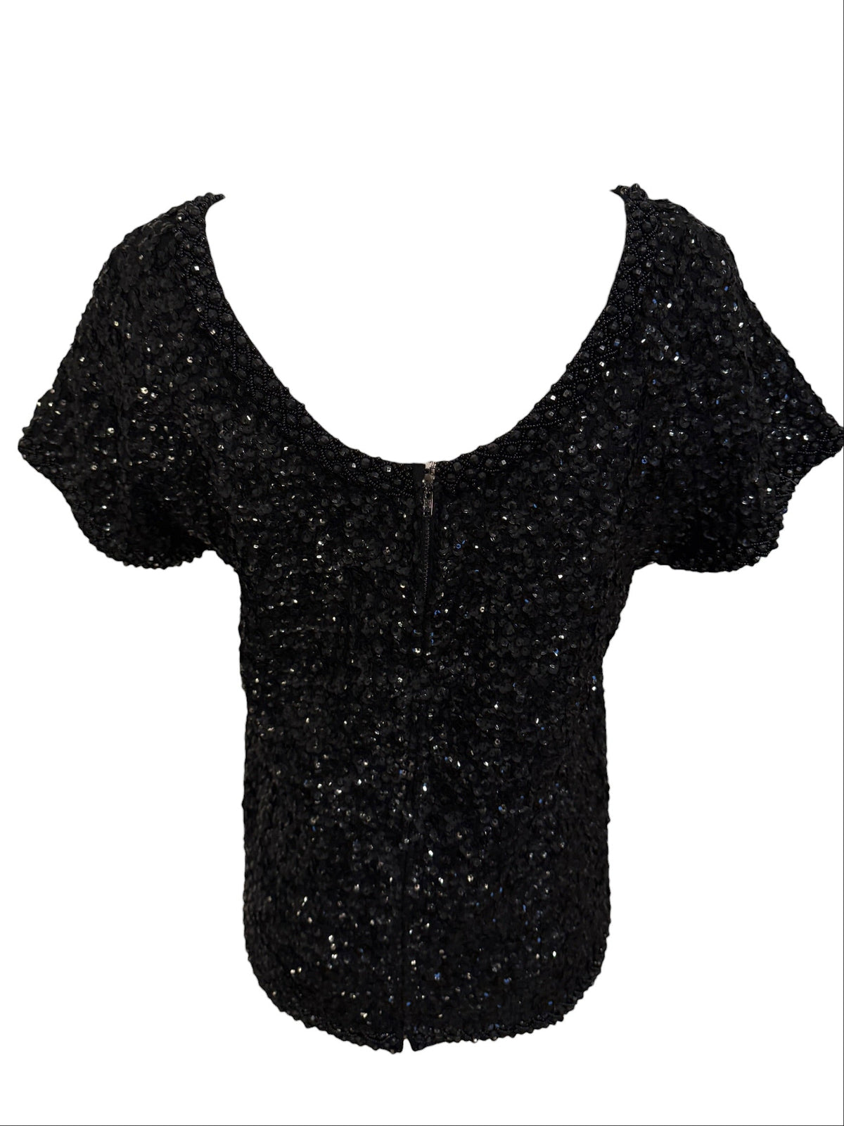 Black glittery top on a white background